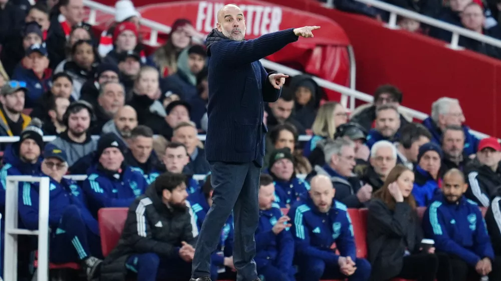 02 February 2025, United Kingdom, London: Manchester City manager Pep Guardiola gestures on the touchline during the English Premier League soccer match between Arsenal and Manchester City at the Emirates Stadium. Photo: Adam Davy/PA Wire/dpa