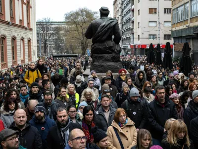 University of Belgrade faculty members and students observe fifteen minutes of silence to pay their respects to the victims of the November 2024 Novi Sad railway station roof collapse, outside the Faculty of Philosophy, in Belgrade, Serbia, February 3, 2025. REUTERS/Marko Djurica