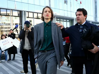 Adele Haenel leaves with her lawyer Yann Le Bras after the verdict in the trial of French film director Christophe Ruggia for sexually abusing her on set while she was an adolescent, at the criminal court in Paris, France, February 3, 2025. REUTERS/Abdul Saboor   TPX IMAGES OF THE DAY