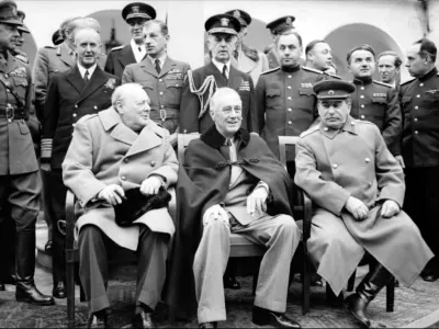 ﻿'The Big Three': Winston Churchill, Franklin D Roosevelt and Joseph Stalin sit for photographs during the Yalta Conference in February 1945.NAM 236Part ofWAR OFFICE SECOND WORLD WAR OFFICIAL COLLECTION