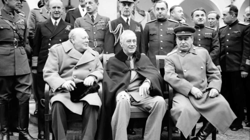 ﻿'The Big Three': Winston Churchill, Franklin D Roosevelt and Joseph Stalin sit for photographs during the Yalta Conference in February 1945.NAM 236Part ofWAR OFFICE SECOND WORLD WAR OFFICIAL COLLECTION