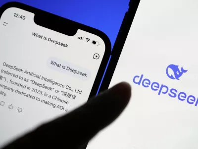 FILE PHOTO: The logo of DeepSeek is displayed alongside its AI assistant app on a mobile phone, in this illustration picture taken January 28, 2025. REUTERS/Florence Lo/Illustration/File Photo