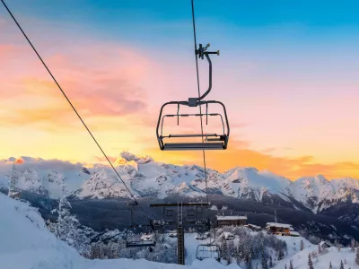 FB8J1H Winter mountains panorama with ski slopes and ski lifts near Vogel ski center, Slovenia