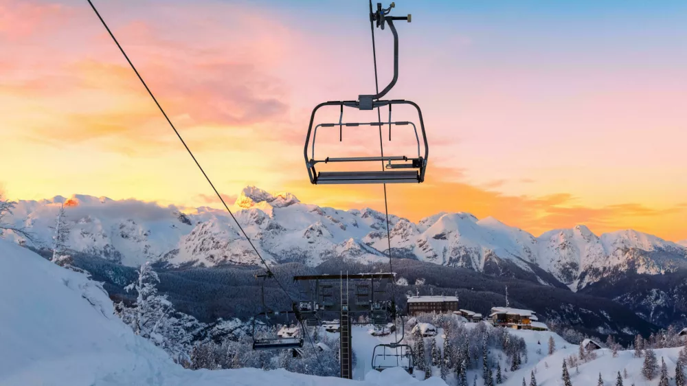 FB8J1H Winter mountains panorama with ski slopes and ski lifts near Vogel ski center, Slovenia