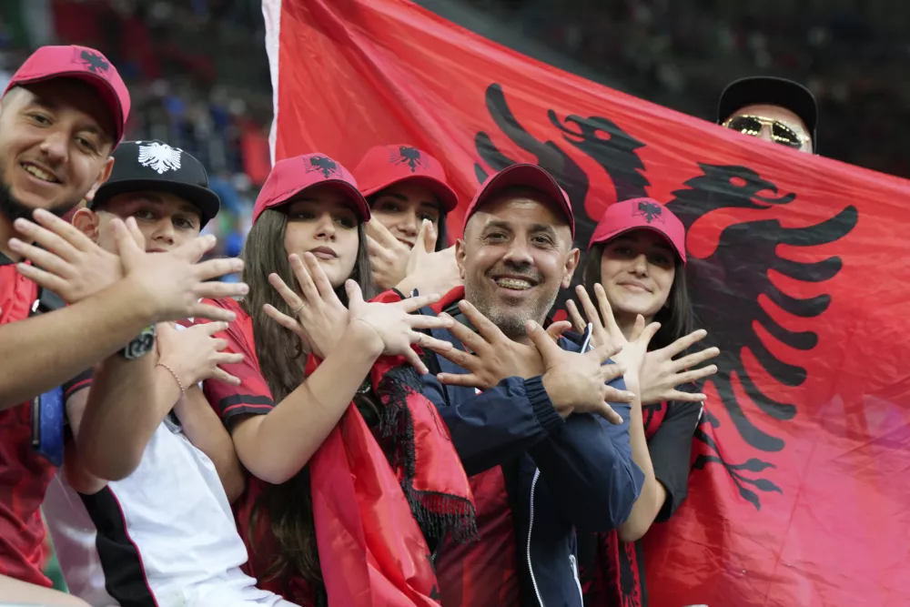 FILE - Albanian supporters gesture as they wait for the start of the Group B match between Italy and Albania at the Euro 2024 soccer tournament in Dortmund, Germany, Saturday, June 15, 2024. (AP Photo/Martin Meissner, File)