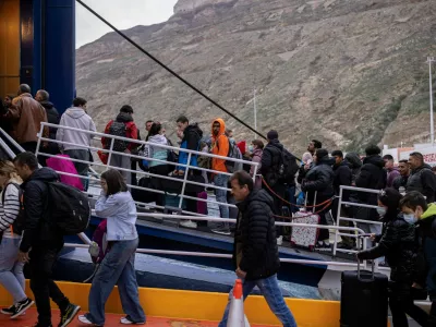 People board a ferry to Piraeus, during an increased seismic activity on the island of Santorini, Greece, February 4, 2025. REUTERS/Alkis Konstantinidis