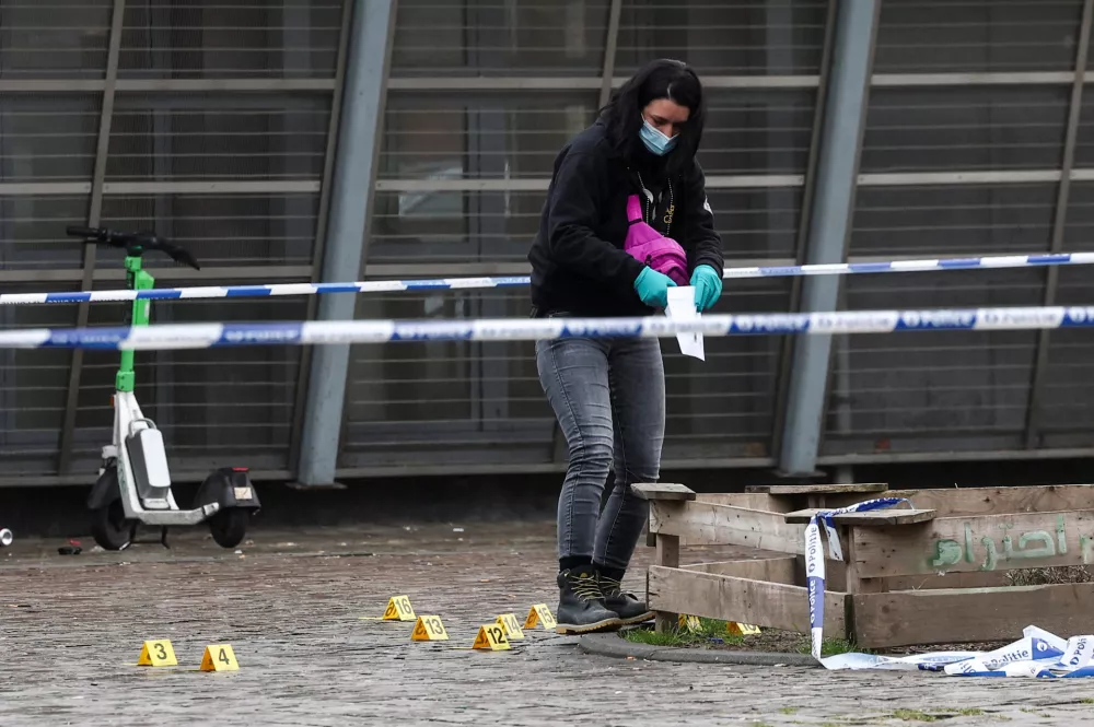 A member of the forensic police works at the Clemenceau metro station, after a shooting took place in Brussels, Belgium February 5, 2025. REUTERS/Yves Herman