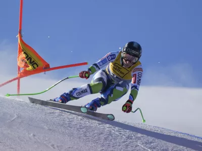 Slovenia's Ilka Stuhec speeds down the course during a men's downhill training, at the Alpine Ski World Championships, in Saalbach-Hinterglemm, Austria, Wednesday, Feb. 5, 2025. (AP Photo/Giovanni Auletta)