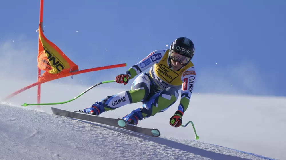 Slovenia's Ilka Stuhec speeds down the course during a men's downhill training, at the Alpine Ski World Championships, in Saalbach-Hinterglemm, Austria, Wednesday, Feb. 5, 2025. (AP Photo/Giovanni Auletta)