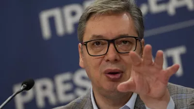 Serbian President Aleksandar Vucic speaks during a public address, a day after one of the biggest protests in years in Belgrade, Serbia, Sunday, Aug. 11, 2024. Vucic said earlier he had been tipped off by Russian intelligence services that a "mass unrest and a coup" were being prepared in Serbia by unspecified Western powers that wish to oust him from power. (AP Photo/Darko Vojinovic)