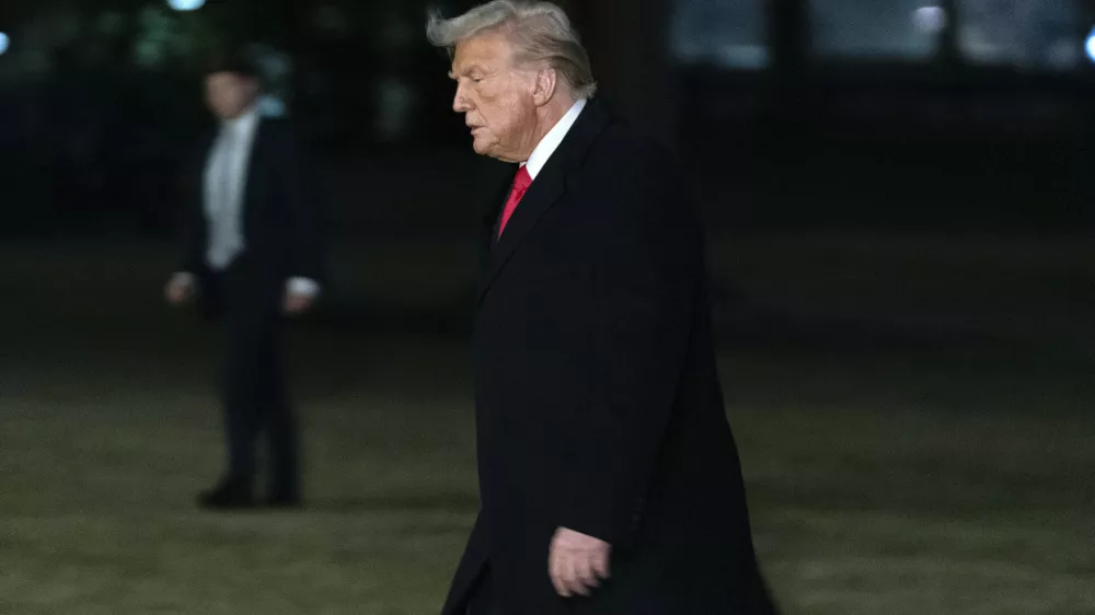 President Donald Trump arrives on the South Lawn of the White House, in Washington, Monday, Feb. 10, 2025. (AP Photo/Jose Luis Magana)