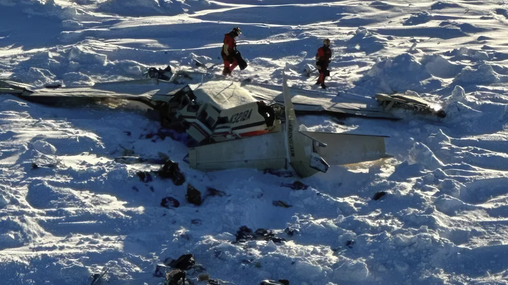 This photo provided by the U.S. Coast Guard on Friday, Feb. 7, 2025, shows a small commuter plane that crashed in western Alaska on a flight that was bound for the hub community of Nome. (U.S. Coast Guard via AP)