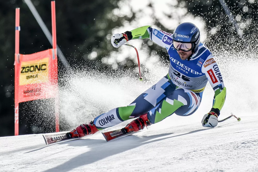 Slovenia's Miha Hrobat speeds down the course during a men's Super-G, at the Alpine Ski World Championships, in Saalbach-Hinterglemm, Austria, Friday, Feb. 7, 2025. (AP Photo/Gabriele Facciotti)