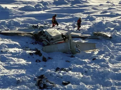 This photo provided by the U.S. Coast Guard on Friday, Feb. 7, 2025, shows a small commuter plane that crashed in western Alaska on a flight that was bound for the hub community of Nome. (U.S. Coast Guard via AP)