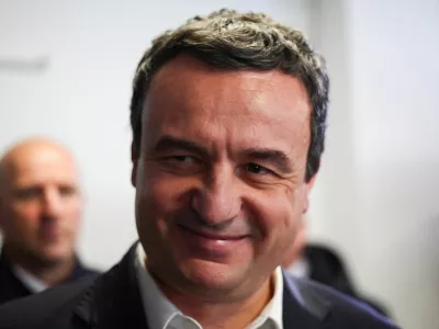 Kosovo's Prime Minister Albin Kurti smiles as he votes during the parliamentary elections in Pristina, Kosovo, February 9, 2025. REUTERS/Florion Goga