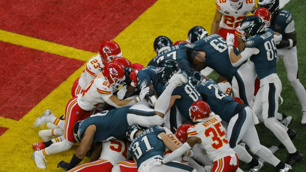 Football - NFL - Super Bowl LIX - Philadelphia Eagles v Kansas City Chiefs - Caesars Superdome, New Orleans, Louisiana, United States - February 9, 2025 Philadelphia Eagles' Jalen Hurts scores a touchdown REUTERS/Brian Snyder