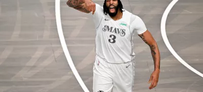 Feb 8, 2025; Dallas, Texas, USA; Dallas Mavericks forward Anthony Davis (3) celebrates after he dunks the ball against the Houston Rockets during the first quarter at American Airlines Center. Mandatory Credit: Jerome Miron-Imagn Images   TPX IMAGES OF THE DAY