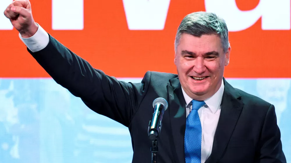 Croatian President and presidential candidate Zoran Milanovic gestures after the first unofficial results of the second round of the presidential election, at Zoran Milanovic's headquarters in Zagreb, Croatia, January 12, 2025. REUTERS/Antonio Bronic