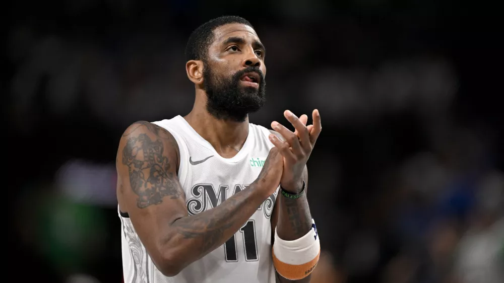 Feb 8, 2025; Dallas, Texas, USA; Dallas Mavericks guard Kyrie Irving (11) acknowledges the fans during the second half of the game against the Houston Rockets at the American Airlines Center. Mandatory Credit: Jerome Miron-Imagn Images