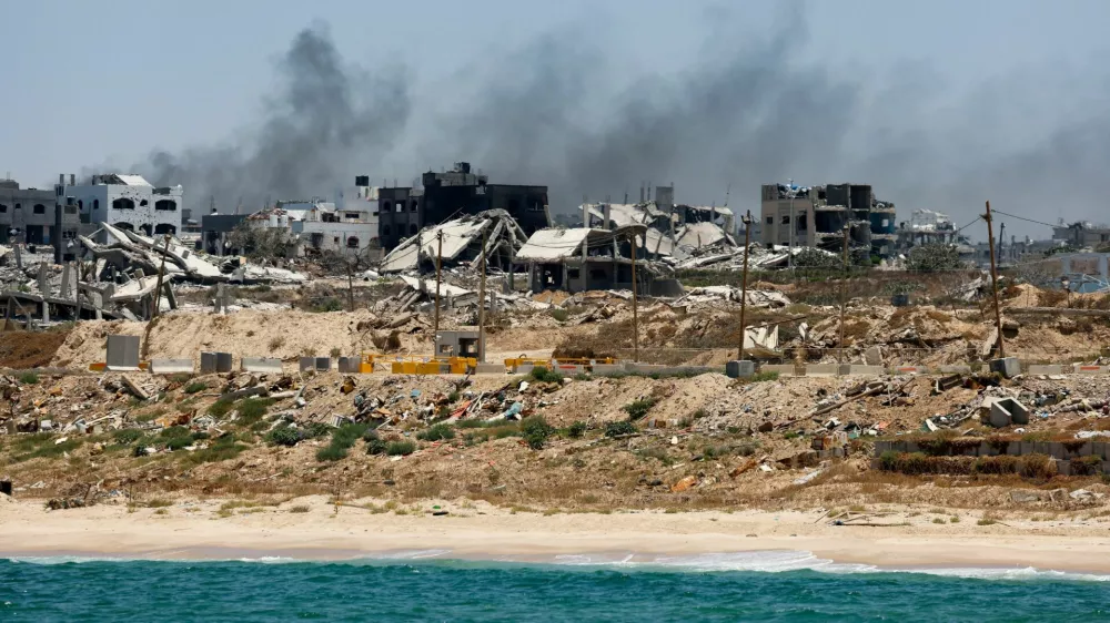 FILE PHOTO: Destroyed buildings are pictured in Gaza, amid the ongoing conflict between Israel and Hamas, as seen near the Gaza coast, June 25, 2024. REUTERS/Amir Cohen/File Photo