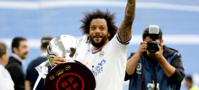 FILE PHOTO: Soccer Football - LaLiga - Real Madrid v Espanyol - Santiago Bernabeu, Madrid, Spain - April 30, 2022 Real Madrid's Marcelo holds the trophy and celebrates after winning LaLiga REUTERS/Juan Medina/File Photo