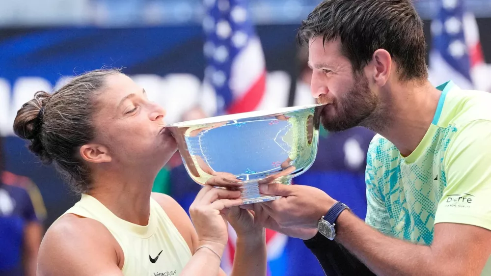 FILE PHOTO: Sept 5 2024; Flushing, NY, USA;  Sara Errani and Andrea Vavassori (ITA) with the US Open trophy after beating Donald Young and Taylor Townsend (USA) in the Mixed Doubles Final on day eleven of the 2024 U.S. Open tennis tournament at USTA Billie Jean King National Tennis Center. Mandatory Credit: Robert Deutsch-Imagn Images/File Photo