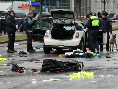 Police works at a car which drove into a crowd in Munich, Germany, February 13, 2025, injuring several people.  REUTERS/Wolfgang Rattay