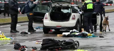 Police works at a car which drove into a crowd in Munich, Germany, February 13, 2025, injuring several people.  REUTERS/Wolfgang Rattay