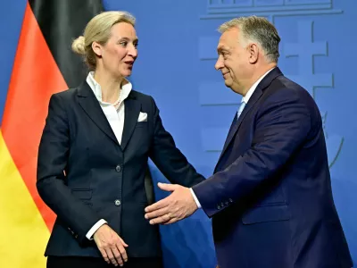 Hungarian Prime Minister Viktor Orban and Alternative for Germany (AfD) party co-leader Alice Weidel react as they hold a joint press conference in Budapest, Hungary, February 12, 2025. REUTERS/Marton Monus