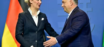 Hungarian Prime Minister Viktor Orban and Alternative for Germany (AfD) party co-leader Alice Weidel react as they hold a joint press conference in Budapest, Hungary, February 12, 2025. REUTERS/Marton Monus