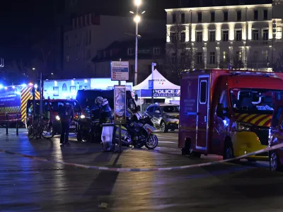 Police officers block the access to the station after two trams collided, injuring dozens of people, though none critically, firefighters said, Saturday, Jan. 11, 2025 in Strasbourg, eastern France. (AP Photo/Pascal Bastien)