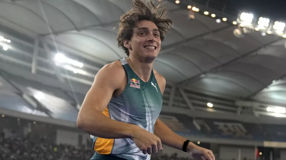 Armand Duplantis of Sweden competes in the men's pole vault finals during the Diamond League event held in Suzhou in eastern China's Jiangsu province Saturday, April 27, 2024. On Saturday, the Swede was the only competitor to clear 5.92 meters, then he cleared 6 meters at his first attempt before raising the bar to 6.25 for three shots at the record. (AP Photo/Ng Han Guan)