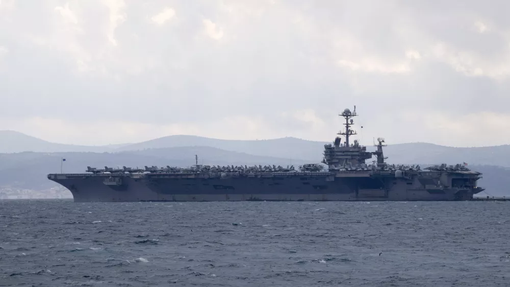 FILE - Aircraft carrier USS Harry S. Truman is moored near Split, Croatia, Feb. 14, 2022. (AP Photo/Darko Bandic, File)