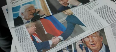 Daily newspapers with covers, dedicated to the recent phone call of Russian President Vladimir Putin and U.S. President Donald Trump, are laid out at a newsstand in a street in Moscow, Russia, February 13, 2025. REUTERS/Maxim Shemetov/Illustration