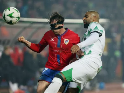 Soccer Football - Conference League - Knockout Phase Playoff - First Leg - Borac Banja Luka v Olimpija - Banja Luka City Stadium, Banja Luka, Bosnia and Herzegovina - February 13, 2025 Borac Banja Luka's Enver Kulasin in action with Olimpija's David Sualehe REUTERS/Amel Emric