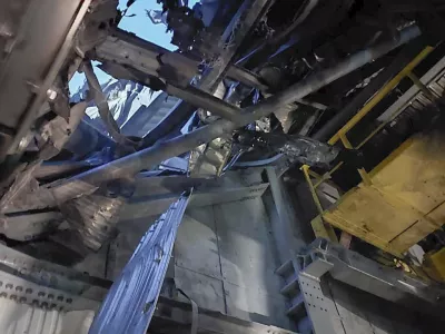 In this photo provided by the Ukrainian Emergency Service, damaged sarcophagus that covers the destroyed 4th reactor of Chernobyl nuclear power plant is seen from inside following a Russian drone attack in Chernobyl, Ukraine, Friday, Feb. 14, 2025. (Ukrainian Emergency Service via AP)