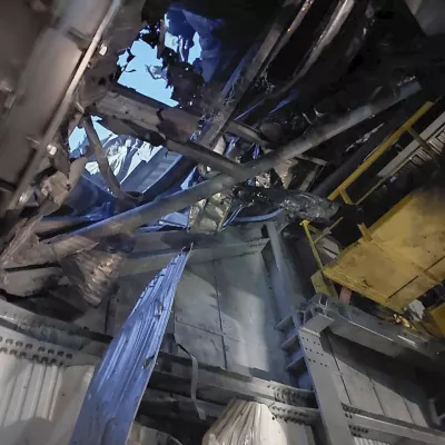 In this photo provided by the Ukrainian Emergency Service, damaged sarcophagus that covers the destroyed 4th reactor of Chernobyl nuclear power plant is seen from inside following a Russian drone attack in Chernobyl, Ukraine, Friday, Feb. 14, 2025. (Ukrainian Emergency Service via AP)