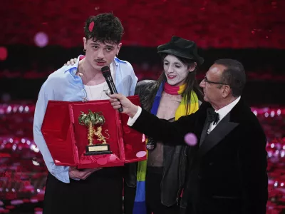 Olly wins the 75th Sanremo Festival 2025 during the final evening of 75th edition of the Sanremo Italian Song Festival at the Ariston Theatre in Sanremo, Italy, Saturday, Feb. 15, 2025. (Marco Alpozzi/LaPresse via AP)