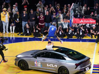 Feb 15, 2025; San Francisco, CA, USA; Osceola Magic guard Mac McClung competes in the slam dunk competition during All Star Saturday Night ahead of the 2025 NBA All Star Game at Chase Center. Mandatory Credit: Cary Edmondson-Imagn Images