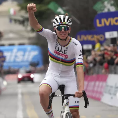 Reigning World Champion Slovenia's Tadej Pogacar celebrates winning Il Lombardia, Tour of Lombardy cycling race, in Como, Italy, Saturday, Oct. 12, 2024. (Gian Mattia D'Alberto/LaPresse via AP)