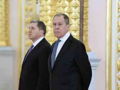 FILE PHOTO: Russian Foreign Minister Sergei Lavrov and Presidential Aide Yuri Ushakov attend a ceremony for newly appointed foreign ambassadors to Russia, at the Kremlin in Moscow, Russia November 24, 2020. Sputnik/Aleksey Nikolskyi/Kremlin via REUTERS ATTENTION EDITORS - THIS IMAGE WAS PROVIDED BY A THIRD PARTY./File Photo