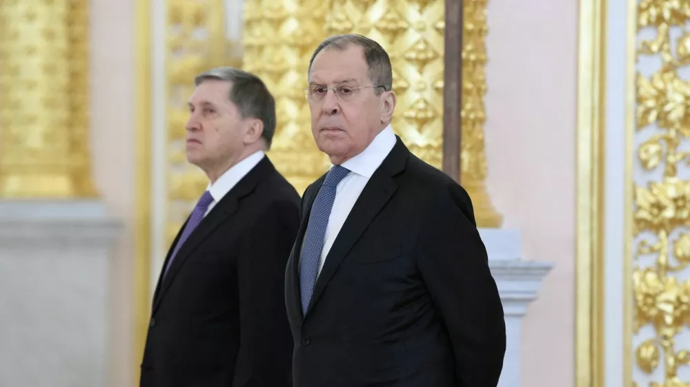 FILE PHOTO: Russian Foreign Minister Sergei Lavrov and Presidential Aide Yuri Ushakov attend a ceremony for newly appointed foreign ambassadors to Russia, at the Kremlin in Moscow, Russia November 24, 2020. Sputnik/Aleksey Nikolskyi/Kremlin via REUTERS ATTENTION EDITORS - THIS IMAGE WAS PROVIDED BY A THIRD PARTY./File Photo