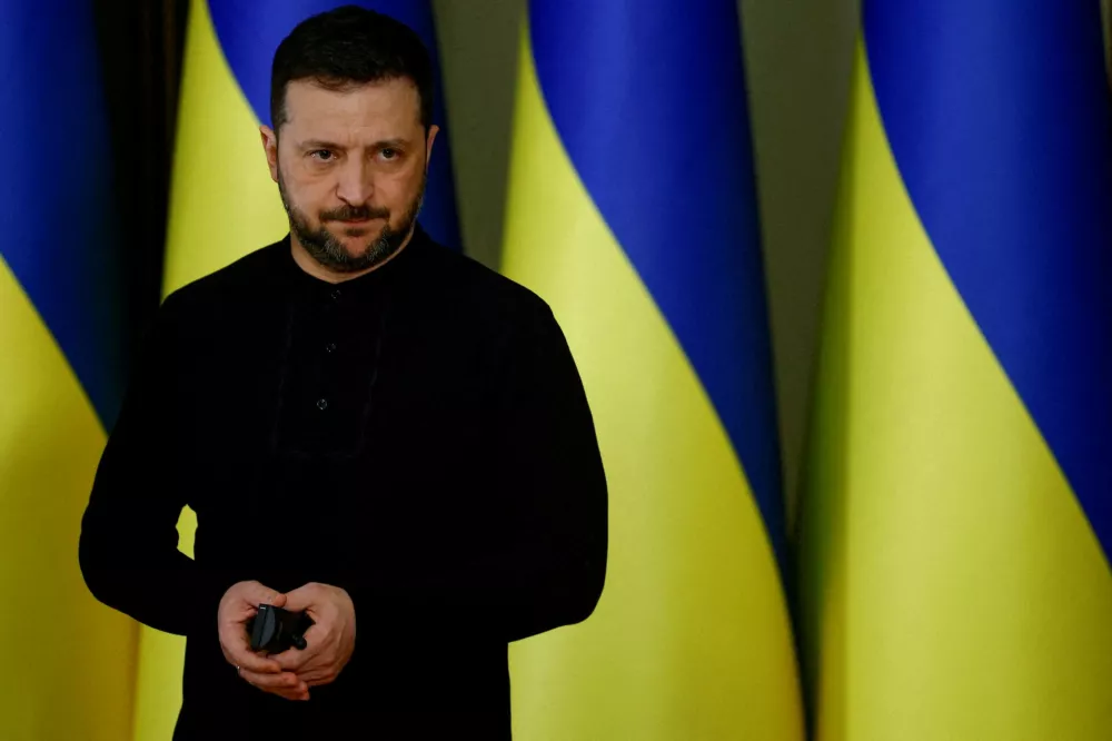 FILE PHOTO: Ukrainian President Volodymyr Zelenskiy looks on during a briefing with visiting U.S. Secretary of the Treasury Scott Bessent (not pictured), in Kyiv, Ukraine, February 12, 2025. REUTERS/Valentyn Ogirenko/File Photo