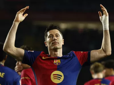 Soccer Football - LaLiga - FC Barcelona v Rayo Vallecano - Estadi Olimpic Lluis Companys, Barcelona, Spain - February 17, 2025 FC Barcelona's Robert Lewandowski celebrates scoring their first goal REUTERS/Albert Gea