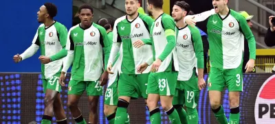 Soccer Football - Champions League - Knockout Phase Playoff - Second Leg - AC Milan v Feyenoord - San Siro, Milan, Italy - February 18, 2025 Feyenoord's Julian Carranza celebrates scoring their first goal with teammates REUTERS/Daniele Mascolo