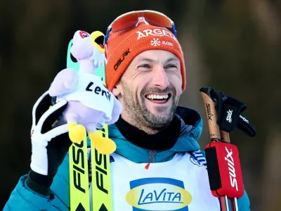 Winter Sports - Biathlon World Championships - Men's 20Km Individual - Lenzerheide, Switzerland - February 19, 2025 Slovenia's Jakov Fak celebrates sixth position in the Men's 20Km Individual REUTERS/Denis Balibouse