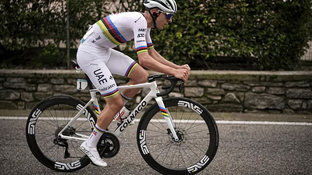 Reigning World Champion Slovenia's Tadej Pogacar pedals on his way to win Il Lombardia, Tour of Lombardy cycling race, in Como, Italy, Saturday, Oct. 12, 2024. (Marco Alpozzi/LaPresse via AP)