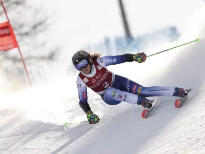 Italy's Federica Brignone speeds down the course during an alpine ski, women's World Cup giant slalom in Sestriere, Italy, Friday, Feb. 21, 2025. (AP Photo/Marco Trovati)