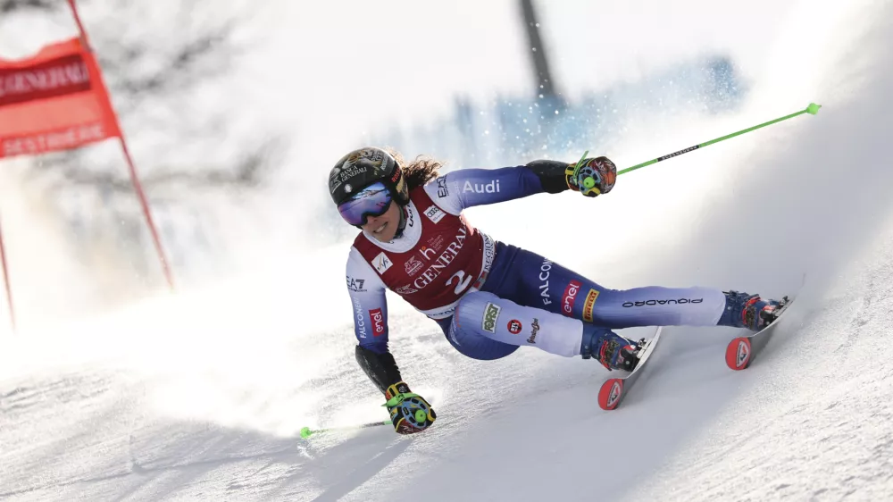 Italy's Federica Brignone speeds down the course during an alpine ski, women's World Cup giant slalom in Sestriere, Italy, Friday, Feb. 21, 2025. (AP Photo/Marco Trovati)