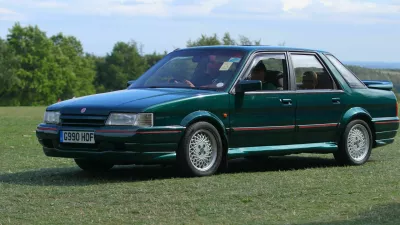 PF2BCB A Green 1989 MG Montego Turbo leaving a Classic Car Show at Temple Newsam in Leeds